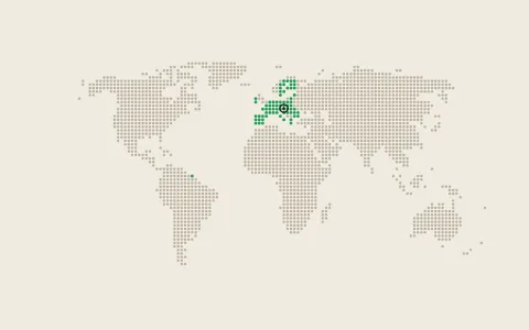Dot map of the world with a marker in Europe