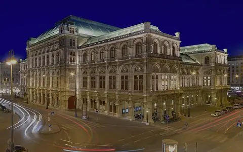 Vienna State Opera in the evening with light trails